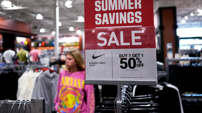 A sale sign is displayed for clothes at a retail store in Vernon Hills, Ill., Monday, June 12, 2023. On Tuesday, the Labor Department reports on U.S. consumer prices for May. (AP Photo/Nam Y. Huh)